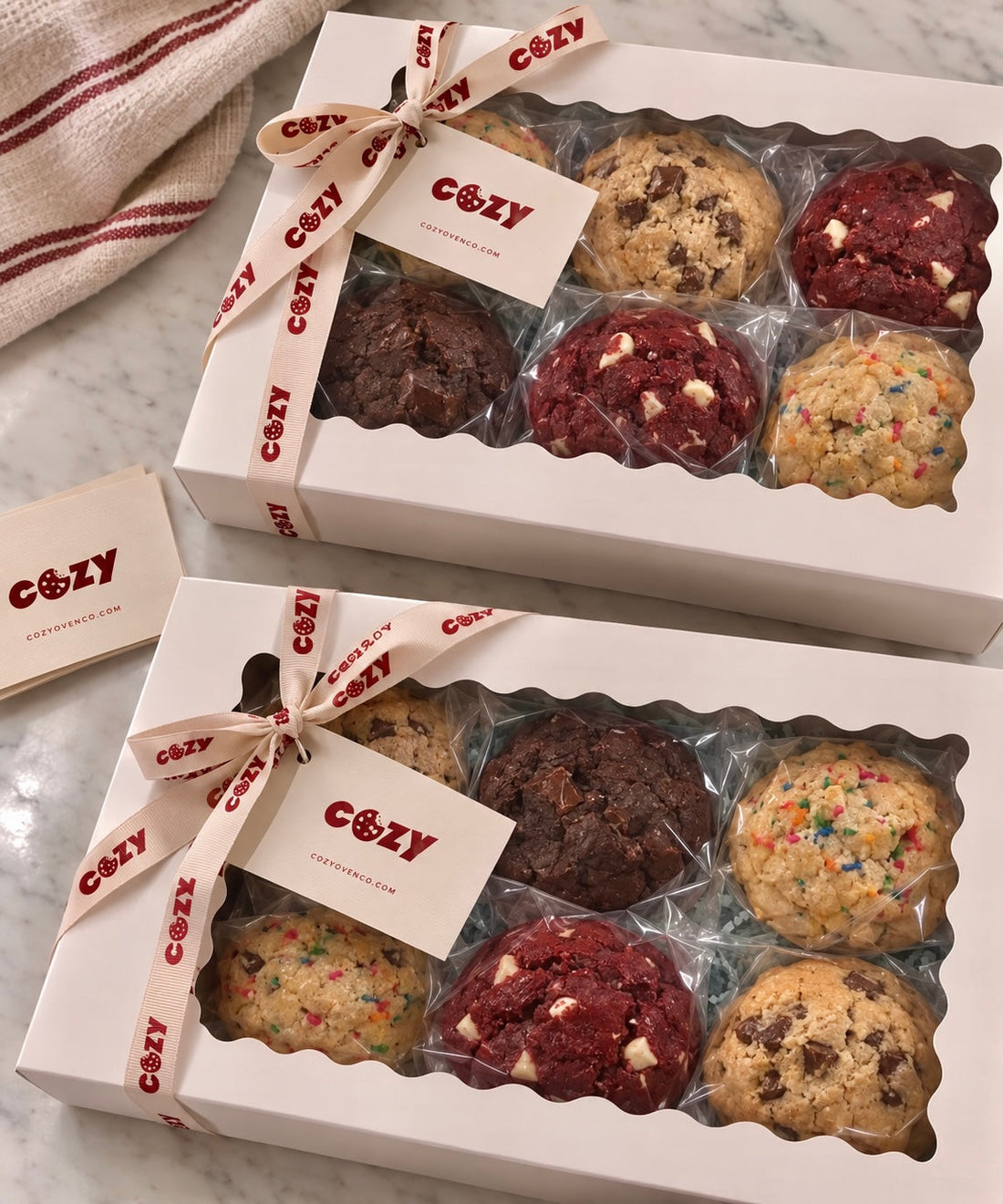 Box of freshly baked jumbo cookies from Cozy Oven with a custom founder pitch card for corporate gifting and investor outreach